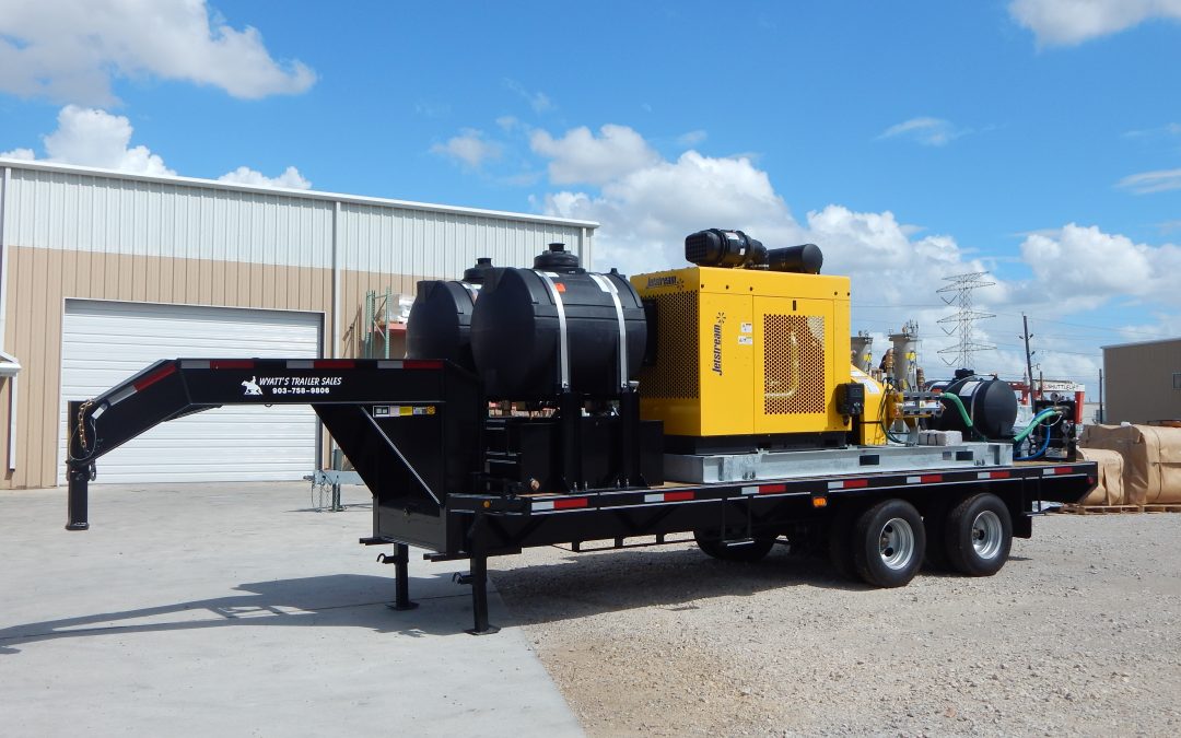 Trailer-mounted Jetstream HydroForce waterblasting unit used for hydrostatic testing of blowout preventer systems, parked in an oil and gas service yard.